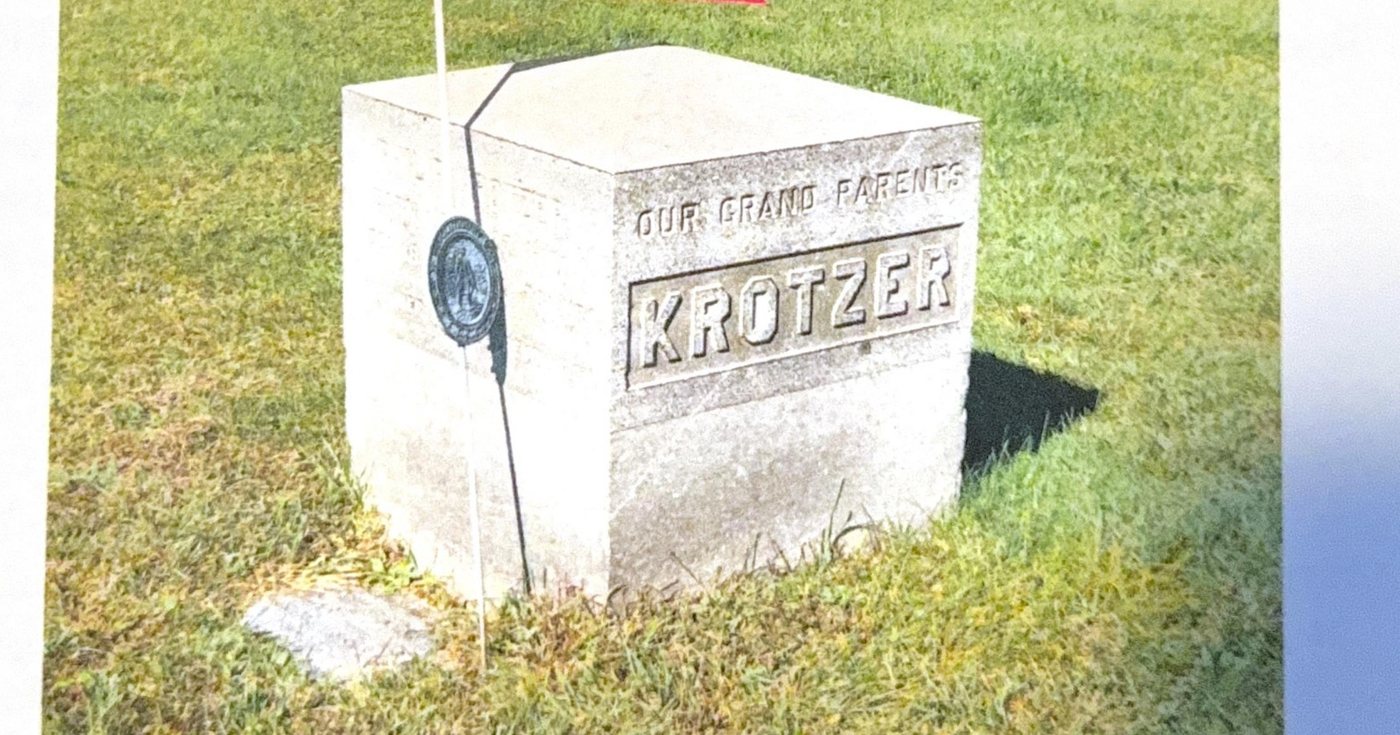 A cube-shaped monument inscribed Our Grandparents Krotzer, marking Philip Krotzer's own grave at Churchville Cemetery