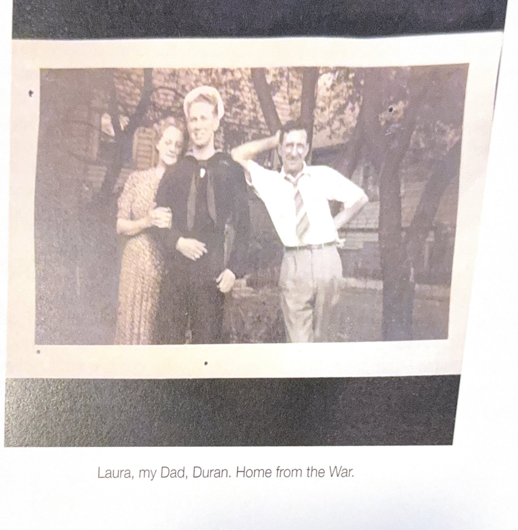 Laura, Robert, and Duran, captioned Home from the War